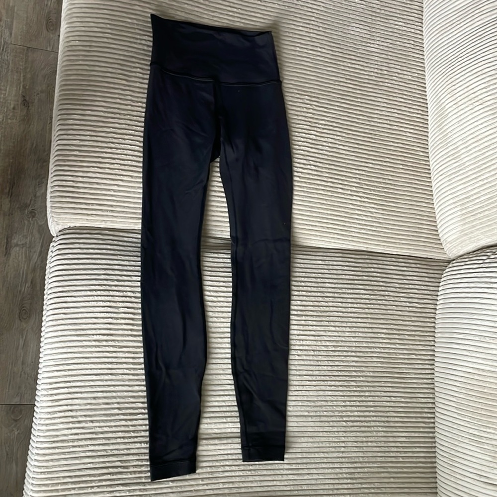 Perfect condition lululemon black leggings size 4